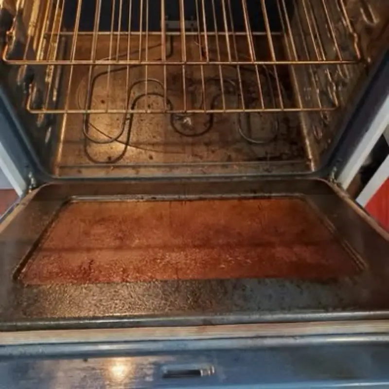 Greasy oven interior before a deep clean
